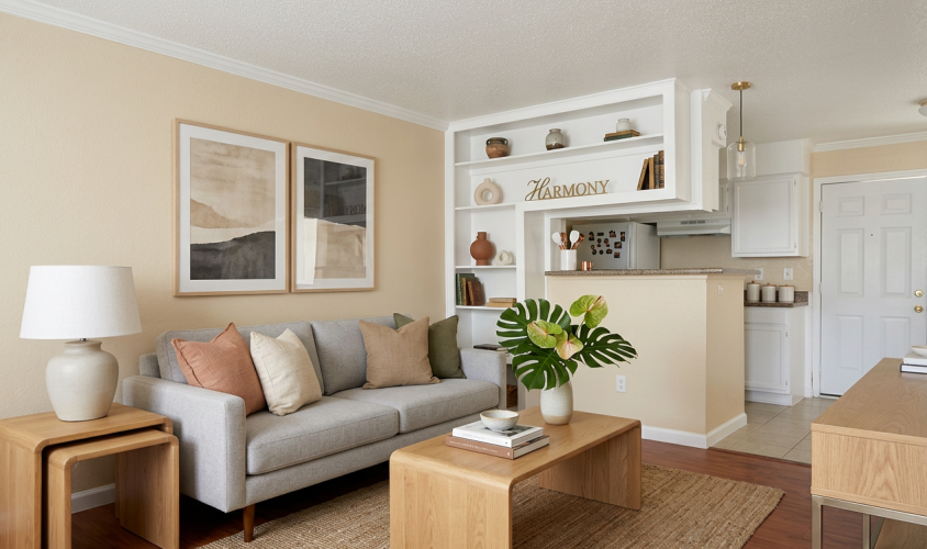 Living room with modern furniture at Falls of Kirkwood apartments in Houston